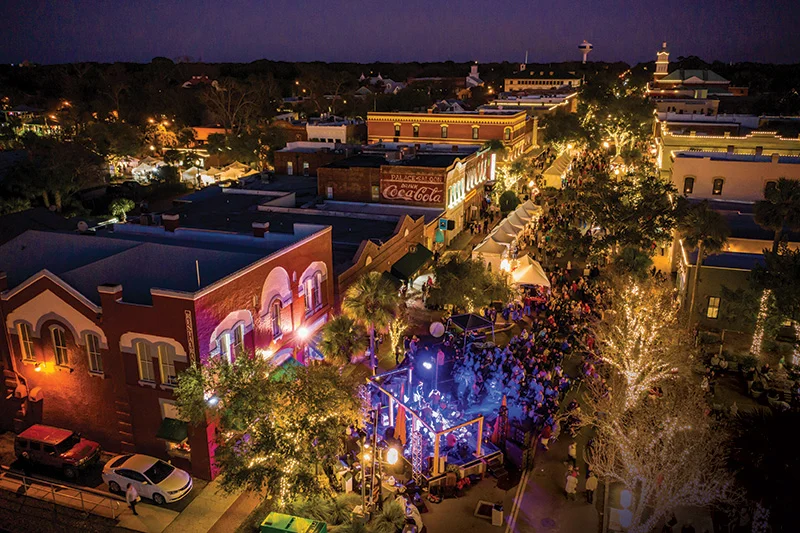 Festive street scene waterfront evening